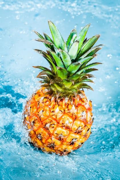 Premium Photo Fresh Pineapple In Water Splashes