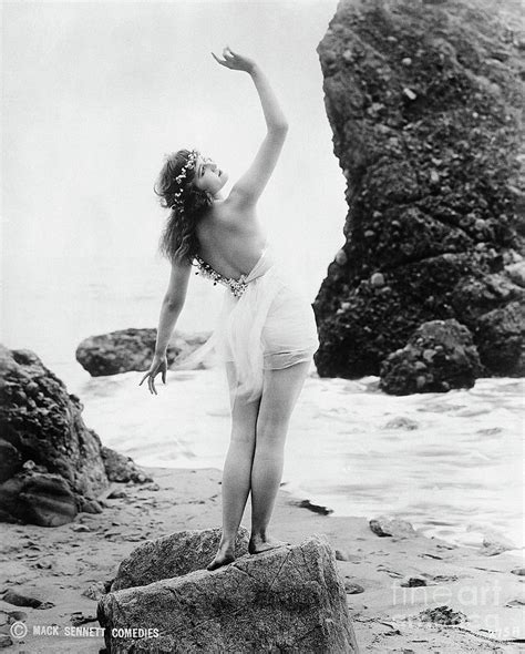 Mack Sennett Bathing Girl On Beach By Bettmann