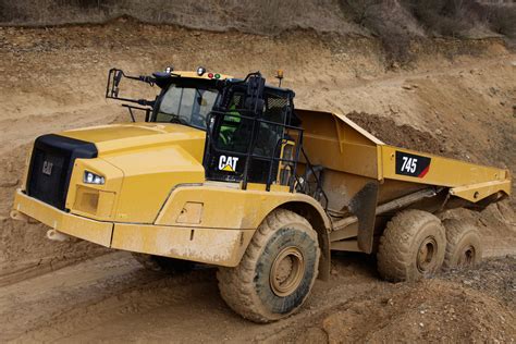 Caterpillar Produces 50000th Cat® Articulated Truck Miningcom