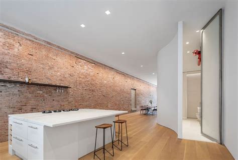 This New York Apartment Combines Exposed Brick Walls With White