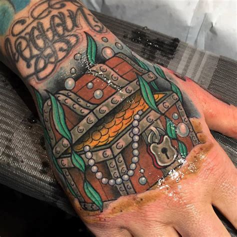 Amazing hands, eagle, roses & pendant chest composition tattoo by inkfingers custom tattoo studio. Treasure Chest Hand Tattoo | Best tattoo design ideas