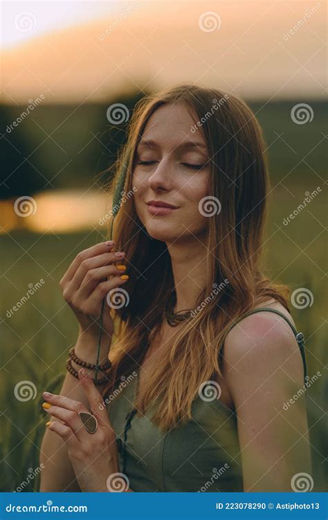 Portrait Gorgeous Young Woman With Long Blond Hair On A Sunset