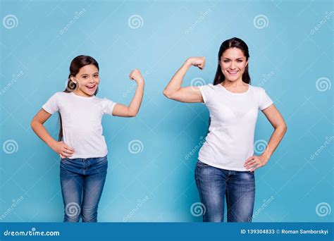 Close Up Photo Two People Brown Haired Mum Mom Small Little Daughter Hand On Biceps Who Run