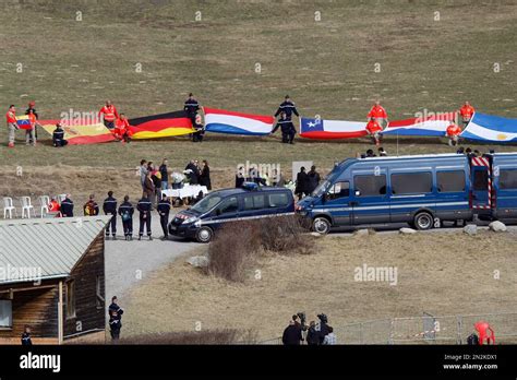 Flags representing differents nations are deployed during an homage