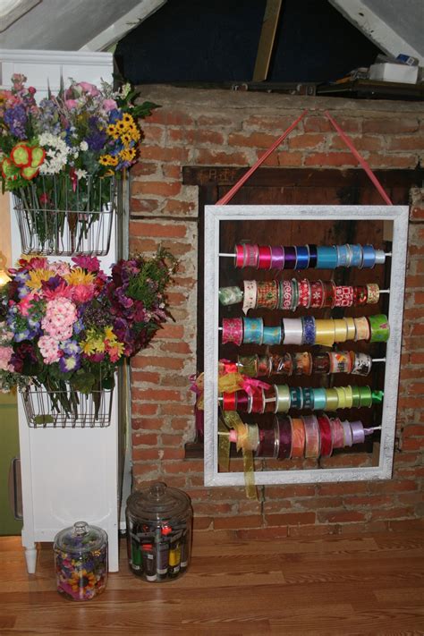 Design your dream craft room with our helpful and innovative ideas. craft room - fake flowers & ribbon storage | Craft room ...