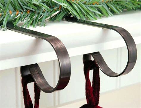Great next to a few real pumpkins or add a paperclip and make place card holders for your thanksgiving table!view this tutorial. 2 Christmas Stockings Lights Garland Holders Mantel ...