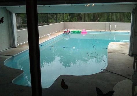 This Ohio Homes Half Indoorhalf Outdoor Pool In A Garage And Ice