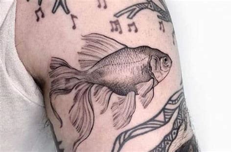 Goldfish tattoos are becoming increasingly popular all over the world and everyone seems to want one of the favorite pets! Goldfish Tattoo Meaning - Cool Goldfish Tattoos