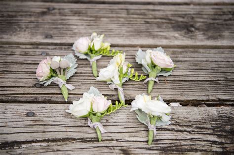 Hypericum is easy to grow being tolerant of most growing conditions and it is vigorous with a tendency to self seed. Pastel Rose Boutonnieres With Hypericum Berries | Rose ...