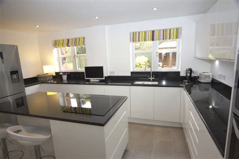 5 out of 5 stars. White Gloss Kitchen with Black Granite Worktops, Worcester ...