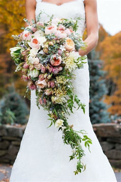 Cascading Bouquets Full Of Whimsy Romance And Bridal Style