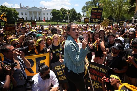 AOC Joins Climate Protesters With Biden You Coward Fight For Us