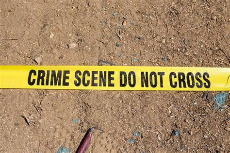 Crime Scene Do Not Cross Tape On Ground Stock Image Image Of Security