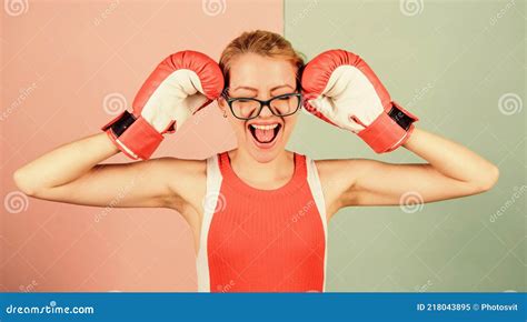 smart strong and sexy super woman concept successful womanhood woman boxing gloves adjust