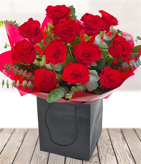 Dozen Red Roses Flower Delivery By Telefloristie
