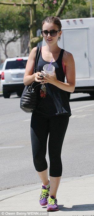 Lily Collins Heads Out Of The Gym In Los Angeles On Thursday Afternoon