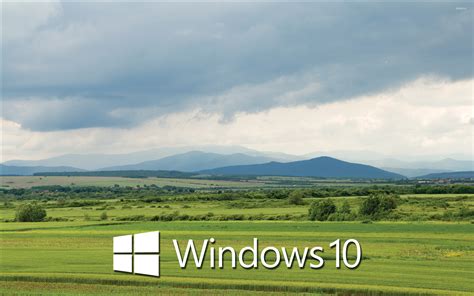 Windows 10 White Text Logo Over The Green Field Wallpaper Computer