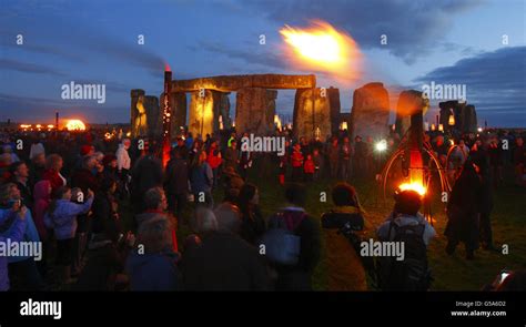 Fires Light Up The Ancient Stones At Stonehenge Near Salisbury