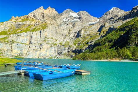 Magical Alpine Lake With High Mountains And Glaciers Oeschinensee