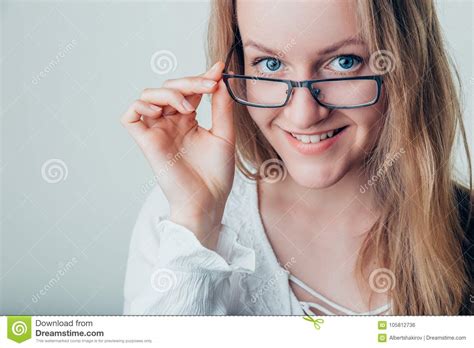 Smiling Young Business Woman Wearing Eye Glasses Looking At The Camera