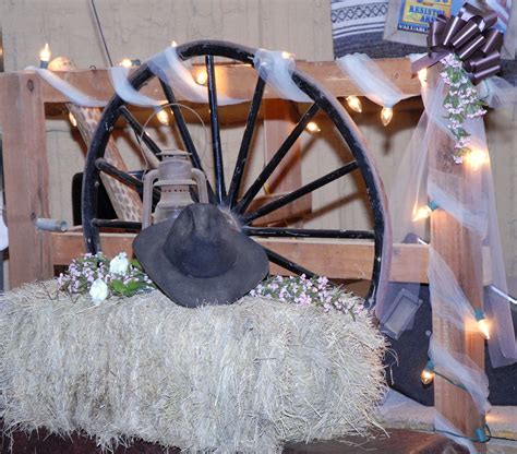 Too often when you're looking for western party ideas, all you find are boots and cowboy hats. Cowboy Wedding decorations...kinda like we had thought ...