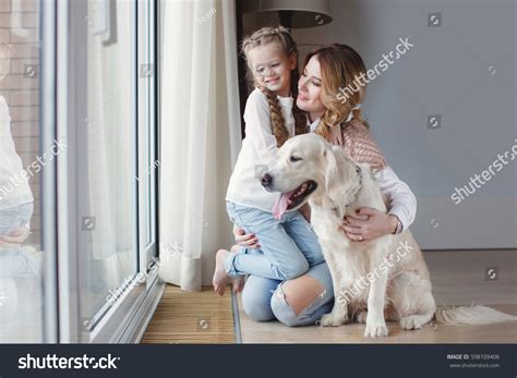 Mother Daughter Dog Home Portrait Happy Stock Photo