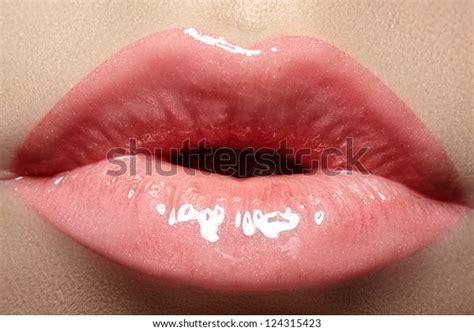 Cosmetics And Makeup Closeup Shoot Of Beautiful Lips Of Woman With
