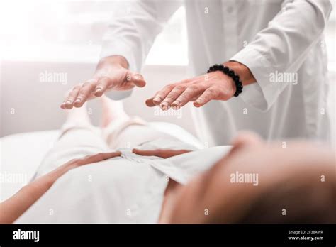Reiki Master Working With Patient Stock Photo Alamy