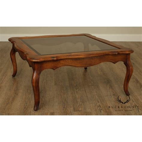 There is no need to limit yourself to square or rectangular glass coffee tables. Ethan Allen Country French Solid Maple Square Glass Top ...