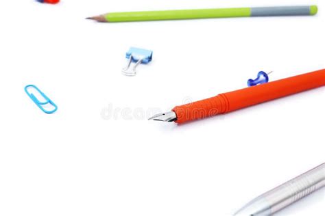 Picture Of Pen Pencil And Paper Pin On The Paper Stock Photo Image
