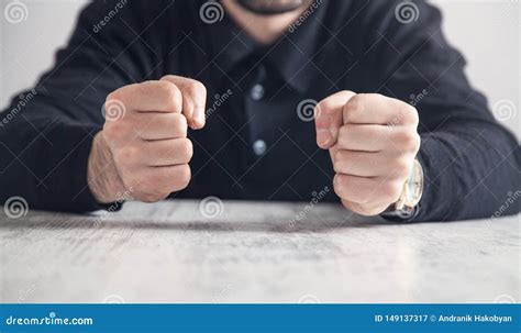 Businessman Hits The Table With His Fists Concept Of Anger Stock Image