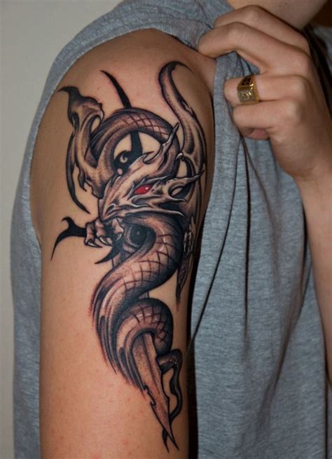 Wonderful tribal tattoo on right shoulder. 75 Dragon Tattoo Designs For Men and Women ...