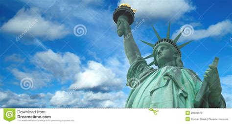 Statue Of Liberty Panorama With Bright Blue Cloudy Sky New York Stock