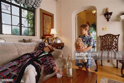 Mom Passed Out Couch Photos Et Images De Collection Getty Images