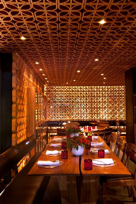 Modern Restaurant Design With Perforated Wall 