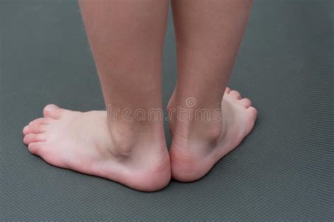 Child Barefoot On Mat Close Up Child S Foot Back View Prevention Of