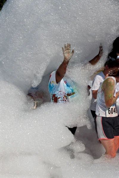 Woman Is Covered In Soap Suds At Bubble Palooza Event Stock Image Everypixel