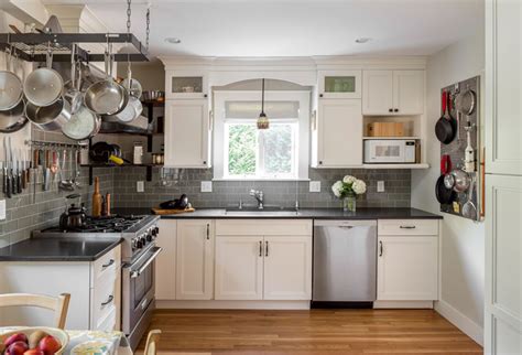 Create a chunky frame out of cabinets, like this white framed kitchen design with wooden inset. How to Make the Most of Your L-Shaped Kitchen - Cutting ...