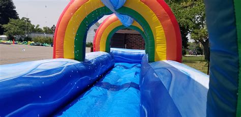 Inflatable Rainbow Slip N Slide (25' x 6' x 9') - King of the Castle
