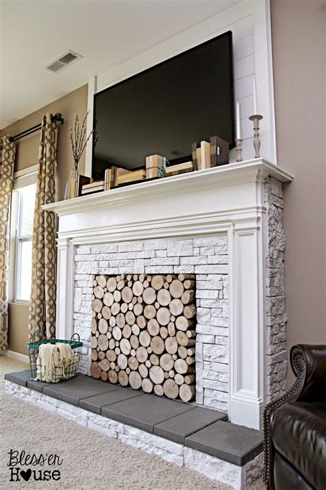 The moldings are a bit more traditional and the dark marble is the perfect accent. DIY Faux Fireplace for Under $600 {The Big Reveal} - Bless ...