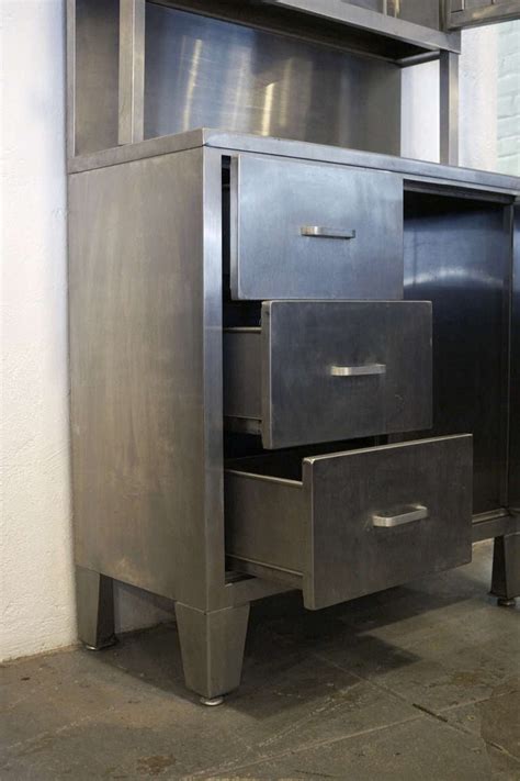 Check up to five results to perform an action. Vintage Stainless Steel Stepback Cabinet at 1stdibs