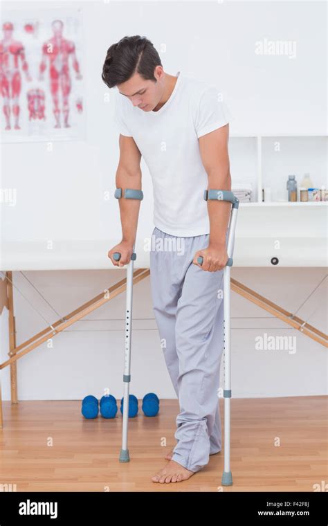 Patient Walking With Crutch Stock Photo Alamy