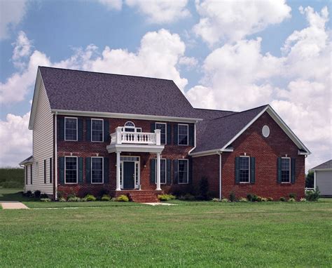 House exceeds new elevation requirements. A colonial style two story home with brick exterior and ...