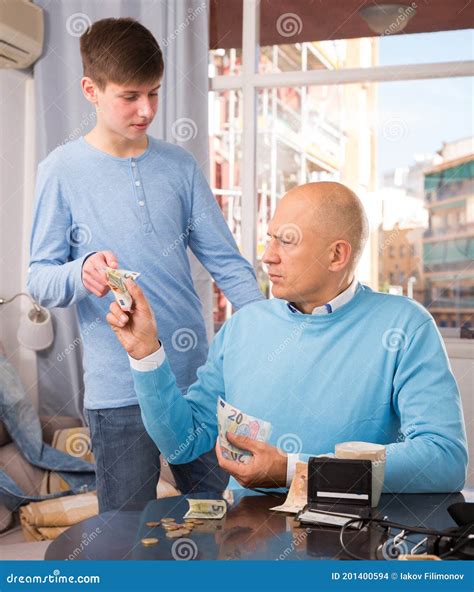 Father Giving Money To Son Stock Photo Image Of House