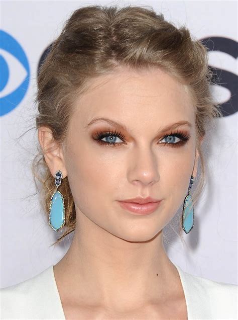 Casual braided updo with blunt bangs for long straight hair here is a cute braided updo from taylor swift, she looked so beautiful with this updo! N/ew PPOm: Taylor Swift Pinned Updo: Red Carpet Hairstyle 2013