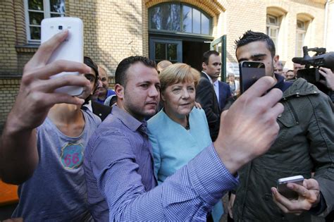 Behind Angela Merkel’s Open Door For Migrants Wsj