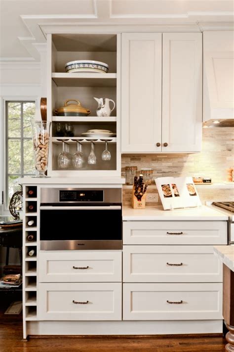 (you don't want anything to get ruined from water, grease, and other splatters.) art above your cabinets, however, will be relatively safe and make a bold. How You Can Incorporate Wine Racks Into Your Design ...