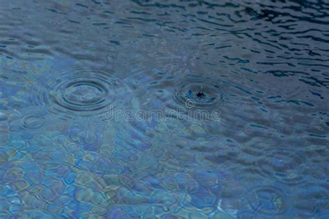 Circle Water Ripple Wave Surface Background Rain Drop On Swimming Pool Blue Background Stock
