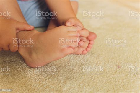 Childrens Bare Feet Childs Bare Feet On The Wooden Floor Stock Photo