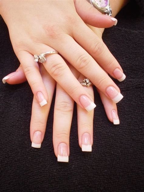 Full set sculptured pink and white acrylic nails. Actual ... Gel, acrylic, and silk nails are widely used.